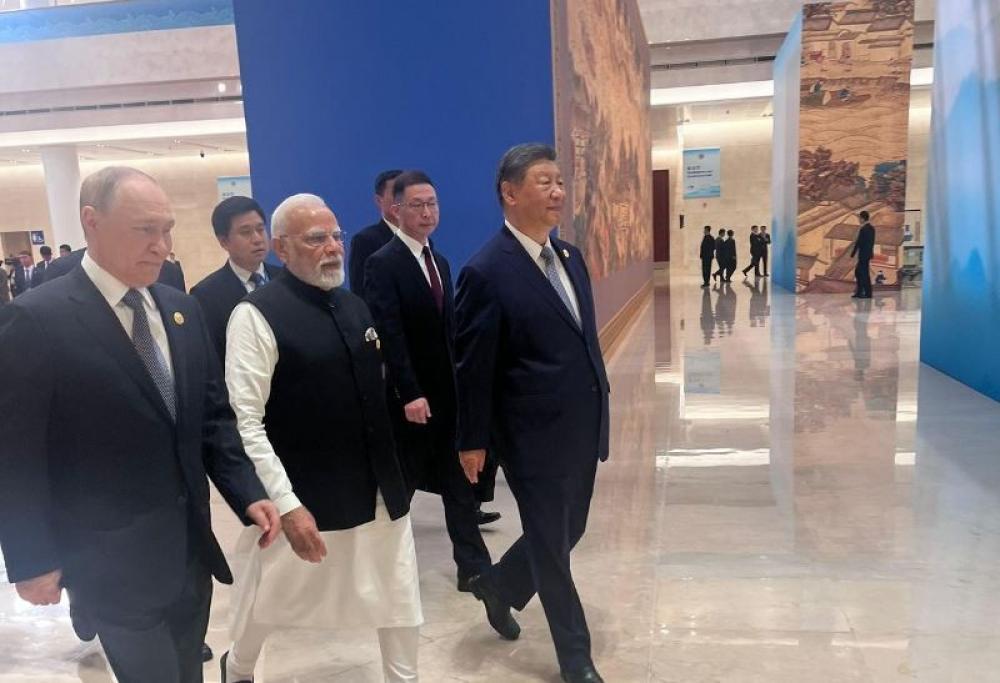 The Weekend Leader - PM Modi Shares Candid Moment with Xi Jinping and Putin at SCO Summit