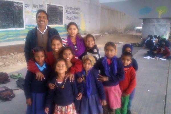 The Weekend Leader - Rajesh Kumar Sharma’s Under the Bridge School teaches poor children under a railway flyover
