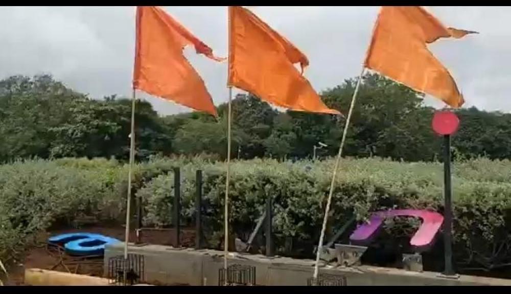 The Weekend Leader - Shiv Sena activists tear down Adani hoarding at Mumbai Airport