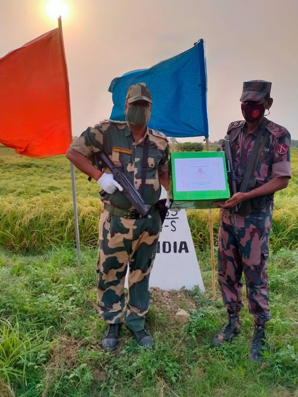 The Weekend Leader - BSF exchange sweets with Pak Rangers, Border Guard Bangladesh