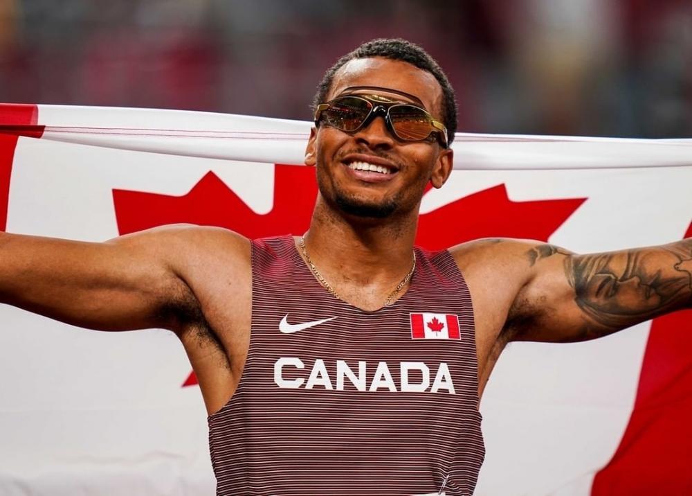 The Weekend Leader - Olympics: Canada's Andre De Grasse wins men's 200m title