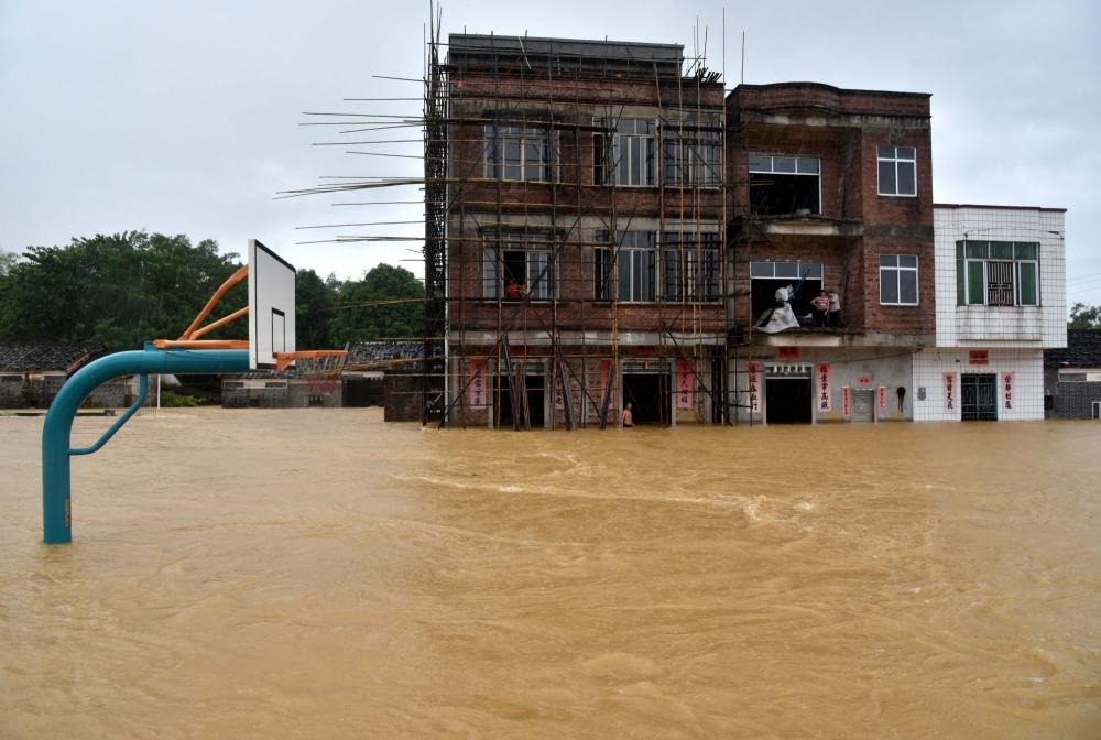 The Weekend Leader - Over 33,000 evacuated as typhoon Lupit makes landfall in China