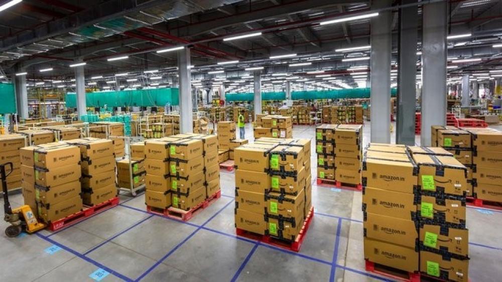 The Weekend Leader - Mask up again, Amazon tells warehouse workers amid Covid spread
