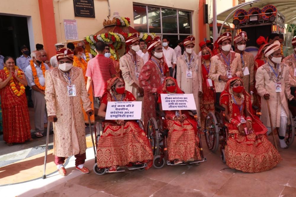 The Weekend Leader - 21 couples with disabilities tie knot in Raj, urge people to get vaccinated