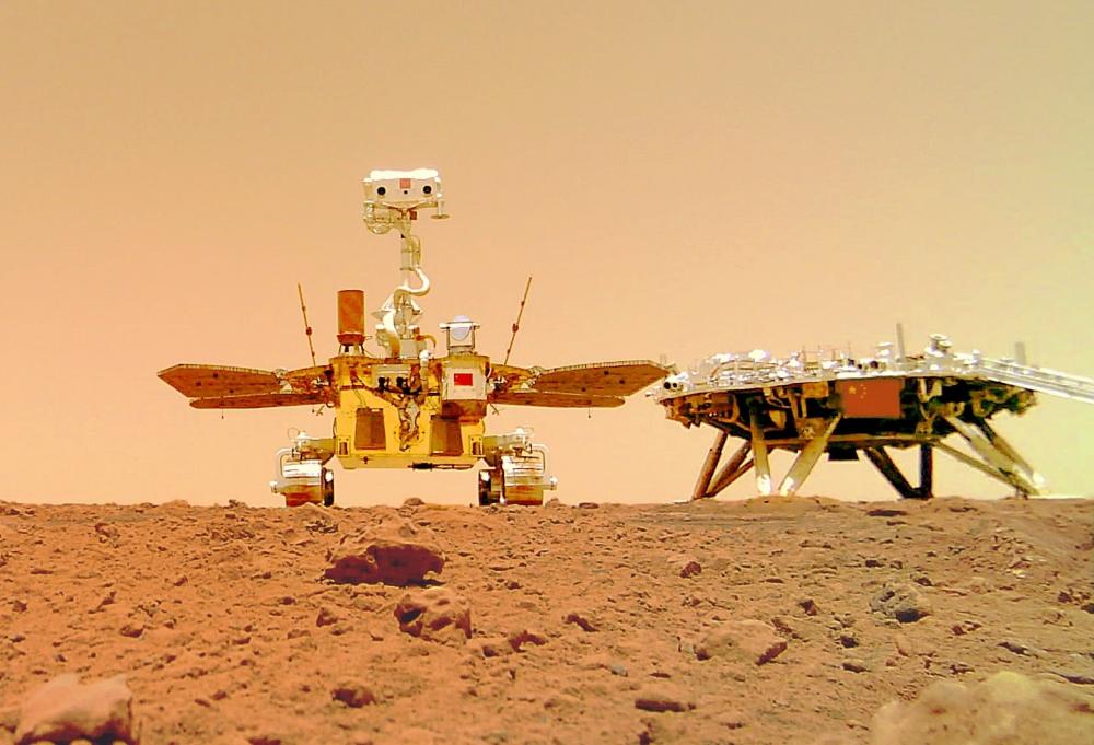 The Weekend Leader - China's Mars rover sends 1st selfie, 'touring' group photos