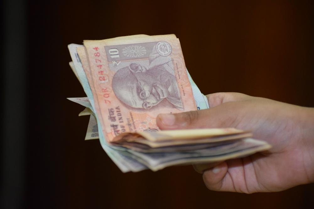 The Weekend Leader - Rupee slips to 15-month low on rising crude oil prices