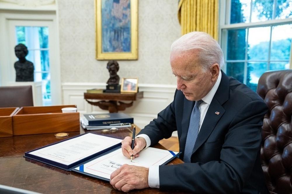 The Weekend Leader - Biden signs law to ban Huawei, ZTE from doing business in US