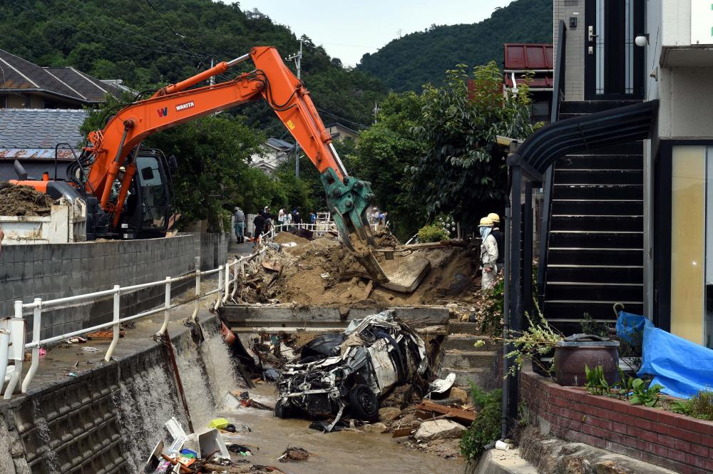 The Weekend Leader - Rain-triggered mudslides in Japan kill 4