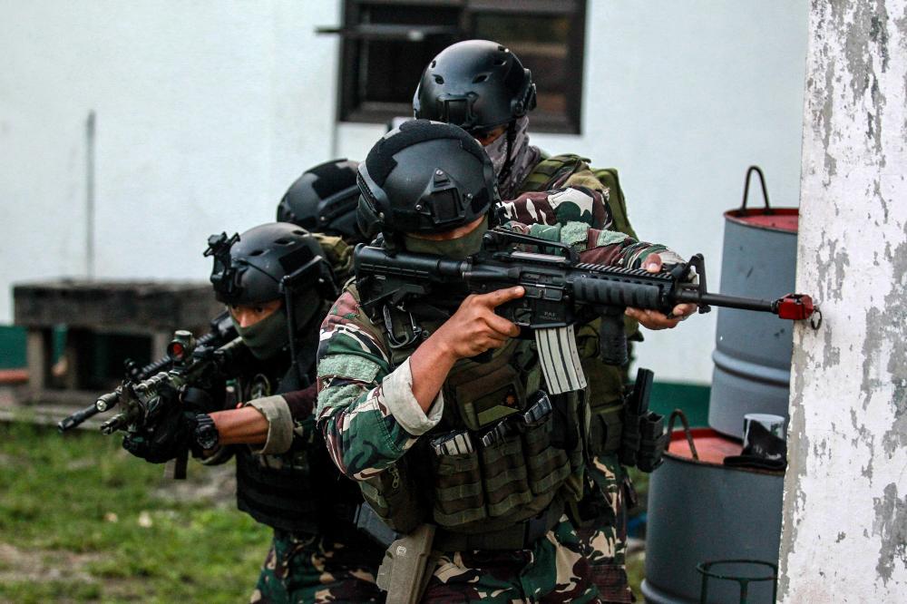 The Weekend Leader - Filipino troops kill 16 armed rebels