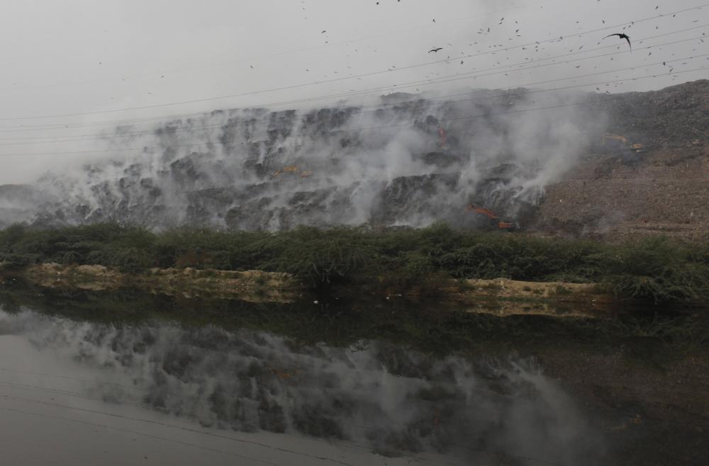 The Weekend Leader - Firefighting at Gazipur landfill on as toxic fumes fill air