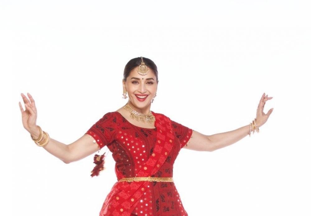 The Weekend Leader - Madhuri Dixit gives free 'Garba' classes on her online dance academy