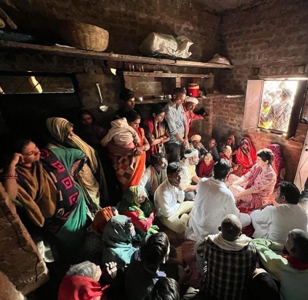 The Weekend Leader - Priyanka Gandhi meets family of dead farmer in Lalitpur
