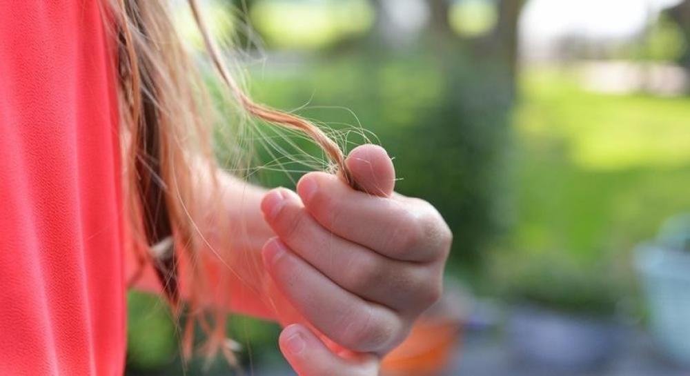 The Weekend Leader - Does using oil on your hair cause it fall?