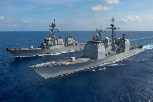 US warships sail through South China Sea, hold exercises