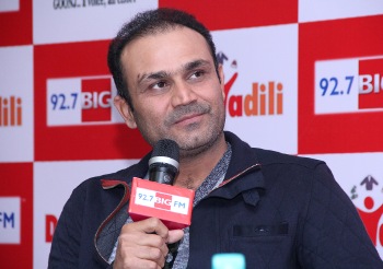 The Weekend Leader - Sehwag to auction his sweater for underprivileged   