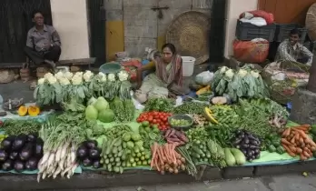 Lower food prices ease India's Sep retail inflation to 4.35% (Lead)
