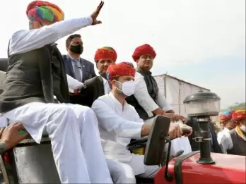 Rahul Gandhi drives to tractor rally in Rajasthan