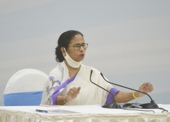 Mamata unveils double-decker open-roof buses in Kolkata