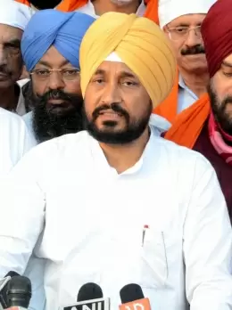 AAP leads Channi's Congress by a whisker in Punjab