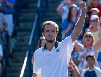 Medvedev tames giant Opelka for Toronto title
