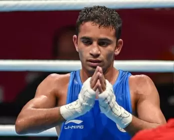 Olympics: Boxer Amit Panghal crashes out (ld with correction in scores)